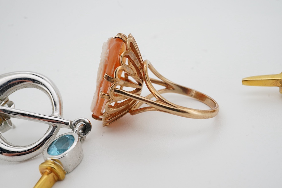 A 9ct gold shell cameo ring, size N, British hallmarks, gross weight 6 grams, and a pair of blue topaz and earrings, mounted in silver, length 5.1cm each, post fittings, Condition: good